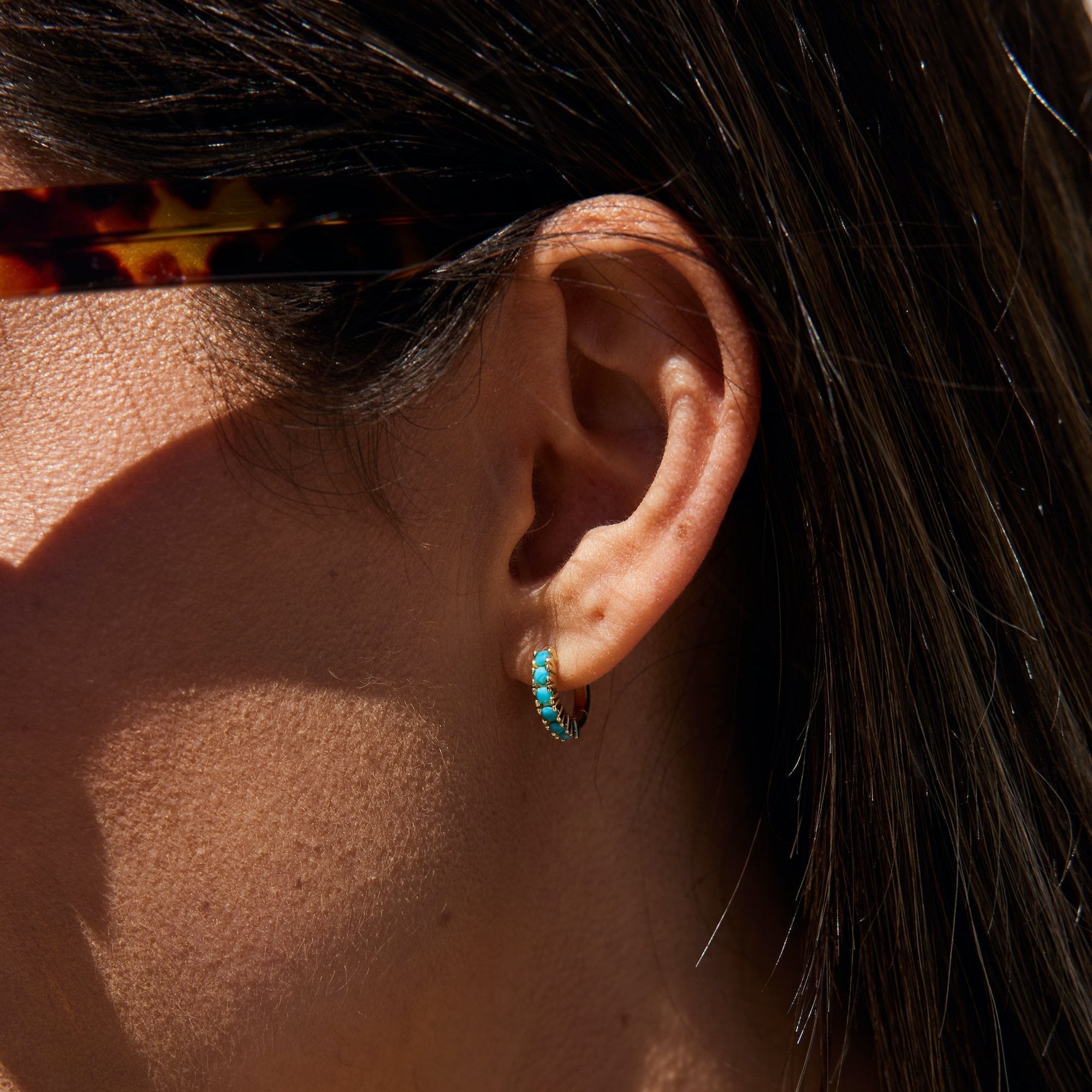 14K gold plated 925 sterling silver small hoops that "hug" your ear-lobe created with turquoise stone inlay. minimalist trendy jewelry made in Vermont, perfect for casual wear, date night, work, weddings, gifting, or everyday wear.